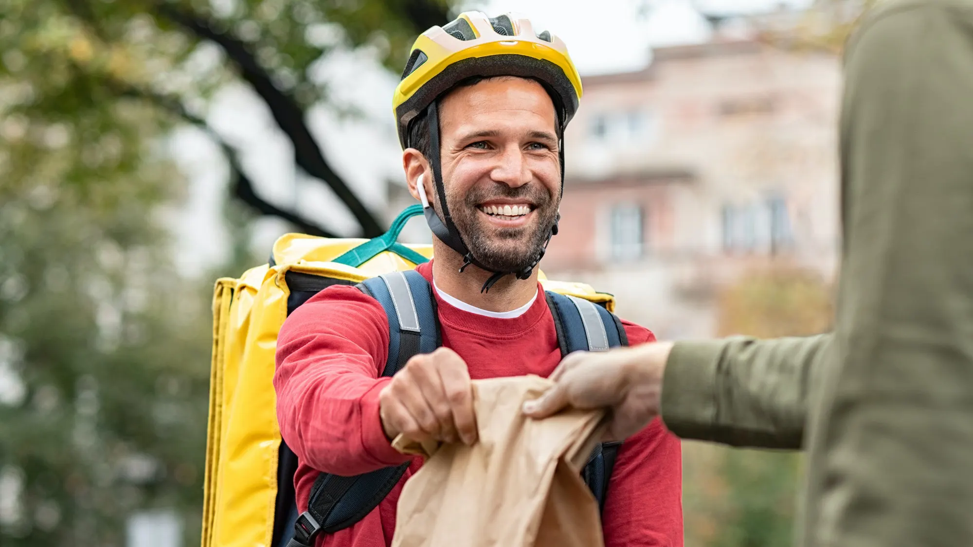 delivery-man-giving-take-away-food